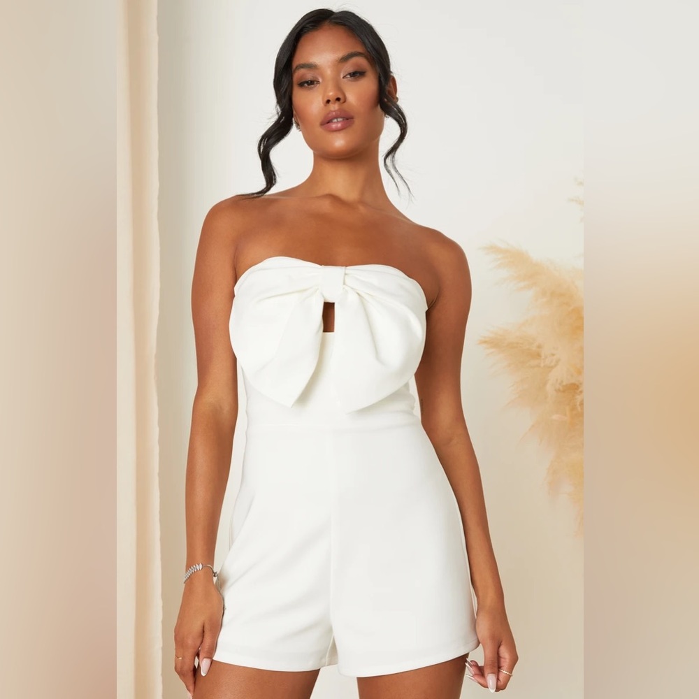 Lulu’s Memorable Status Ivory Strapless Bow-Front Cutout Romper